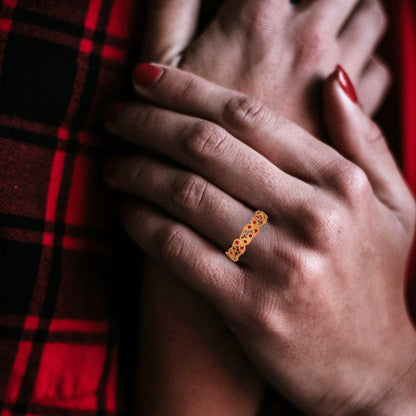 0.17 cttw Simulated Ruby Round Cut Yellow Gold Eternity Wedding Band