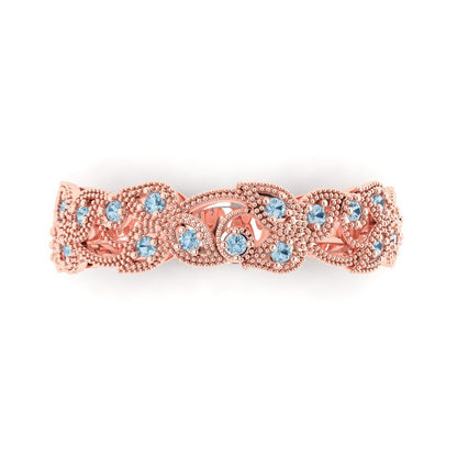 0.17 cttw Natural Sky Blue Topaz Round Cut Rose Gold Eternity Wedding Band