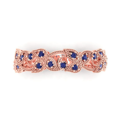 0.17 cttw Simulated Tanzanite Round Cut Rose Gold Eternity Wedding Band