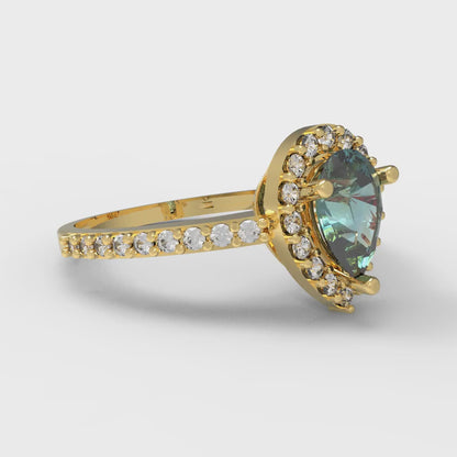 0.755 cttw Blue Moissanite Solitaire with Zirconia Simulated Diamond Accents Engagement Ring - Solid Gold (Pear Cut,7x5mm )