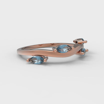 0.4 cttw Natural Sky Blue Topaz Marquise Cut Rose Gold Eternity Wedding Band