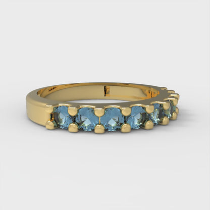 0.63 cttw Natural Sky Blue Topaz Round Cut Yellow Gold Eternity Wedding Band