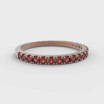 0.285 cttw Natural Garnet Round Cut Rose Gold Eternity Wedding Band
