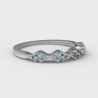 0.1 cttw Natural Sky Blue Topaz Round Cut White Gold Eternity Wedding Band