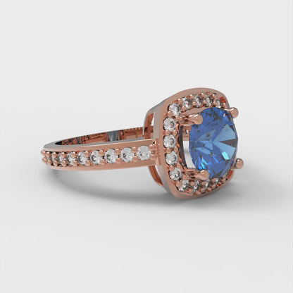 1.335 cttw Simulated Tanzanite Solitaire with Zirconia Simulated Diamond Accents Engagement Ring - Solid Rose Gold (VVS1, Round Cut,6.5mm)