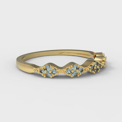 0.1 cttw Natural Swiss Blue Topaz Round Cut Yellow Gold Eternity Wedding Band