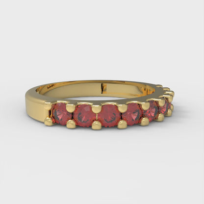 0.63 cttw Simulated Ruby Round Cut Yellow Gold Eternity Wedding Band