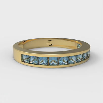 0.78 cttw Natural Swiss Blue Topaz Princess Cut Yellow Gold Eternity Wedding Band